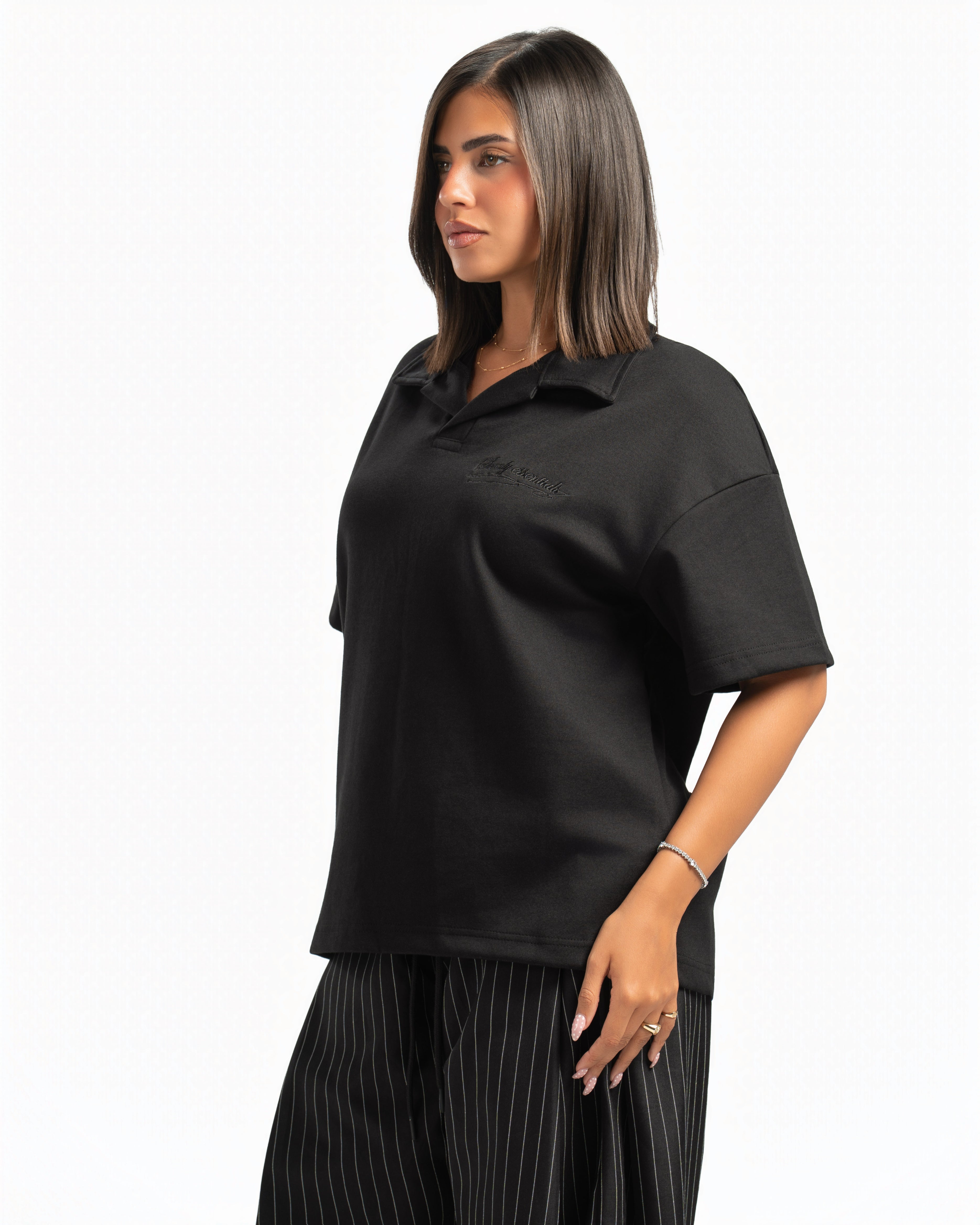 Women – Open-Collar Polo in Black, side view (cover)