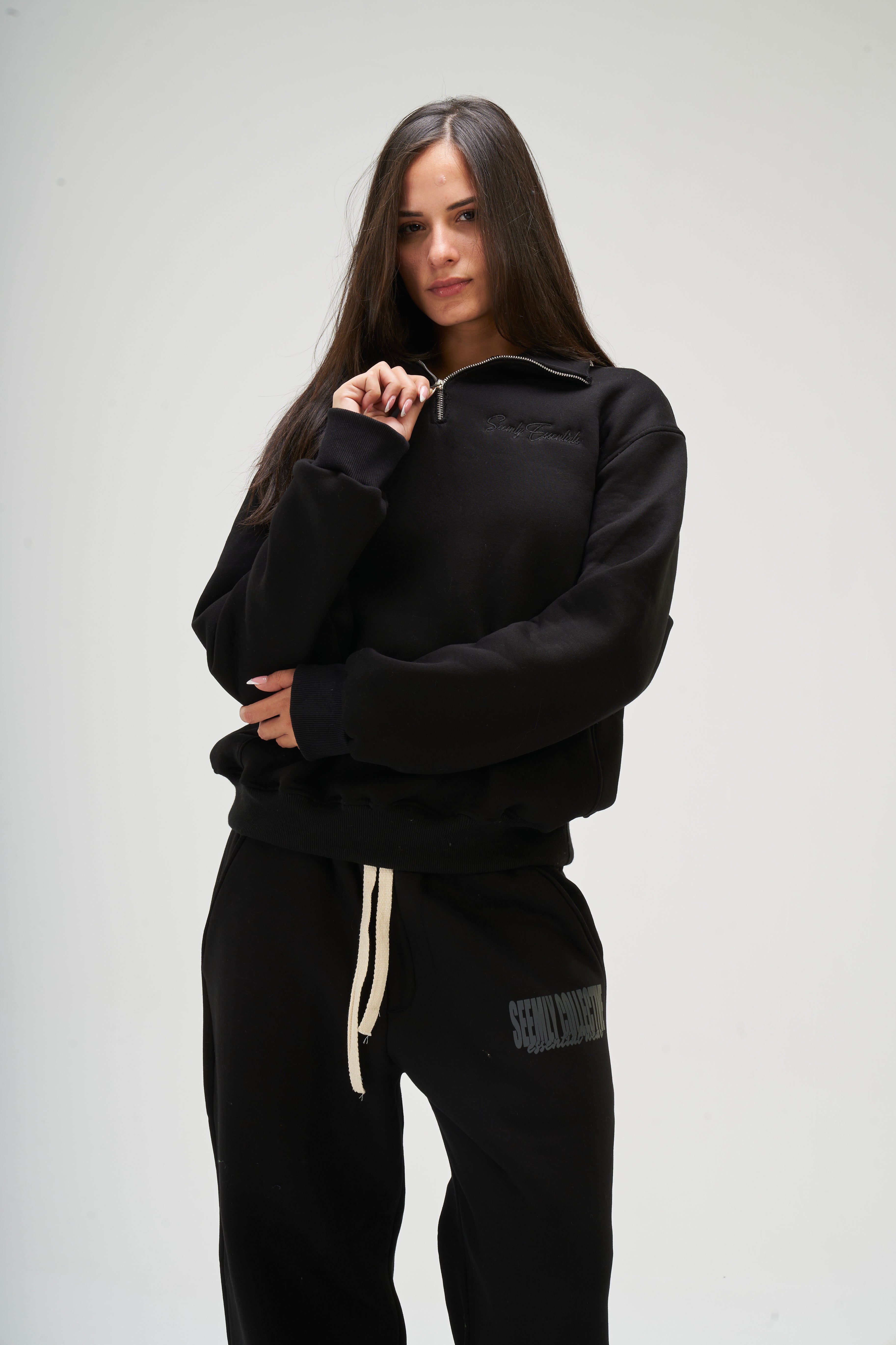 Women – Black Q-Zip – Seemly Essentials (cover)